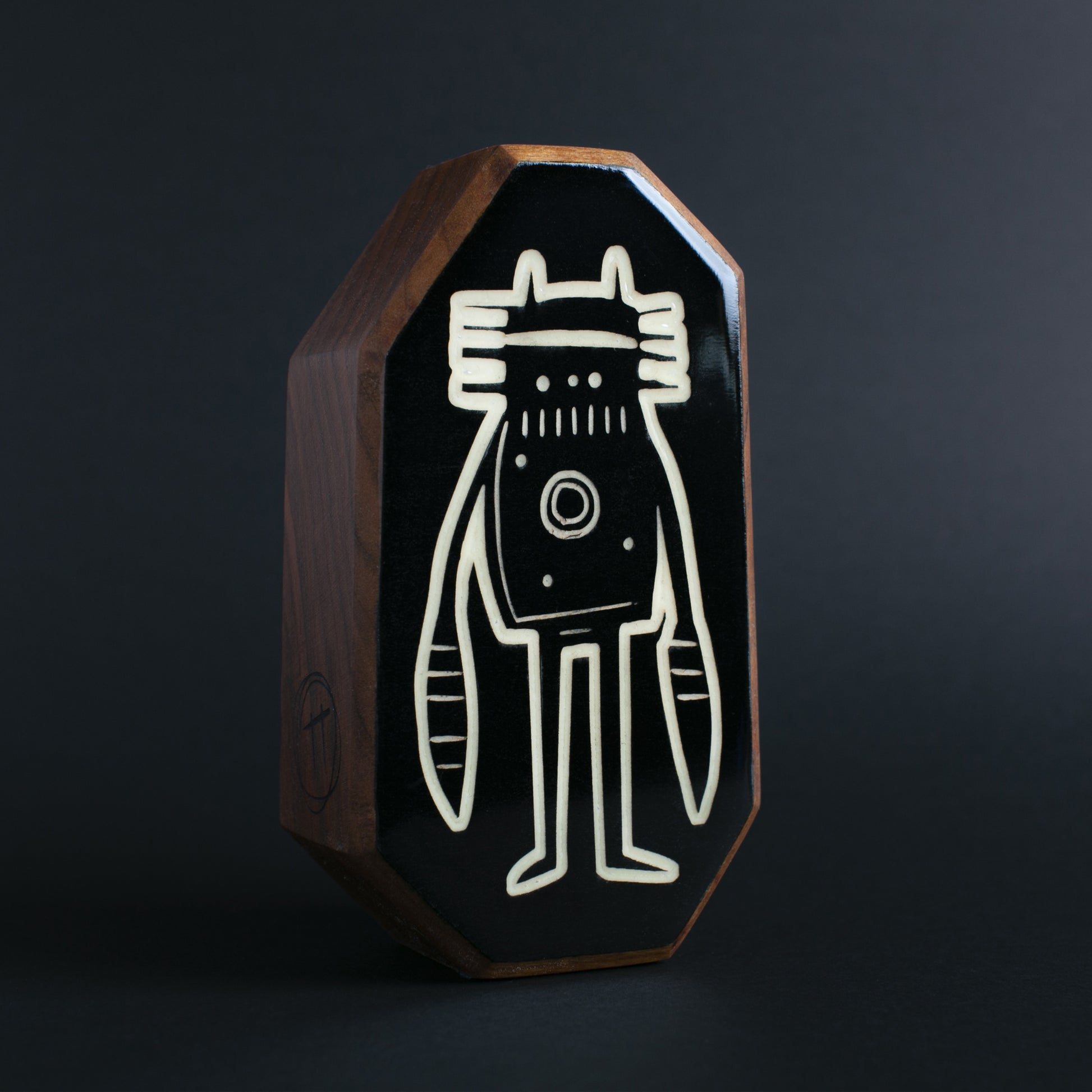 Cherry wood glow charm featuring Blizznek with a calming nighttime light