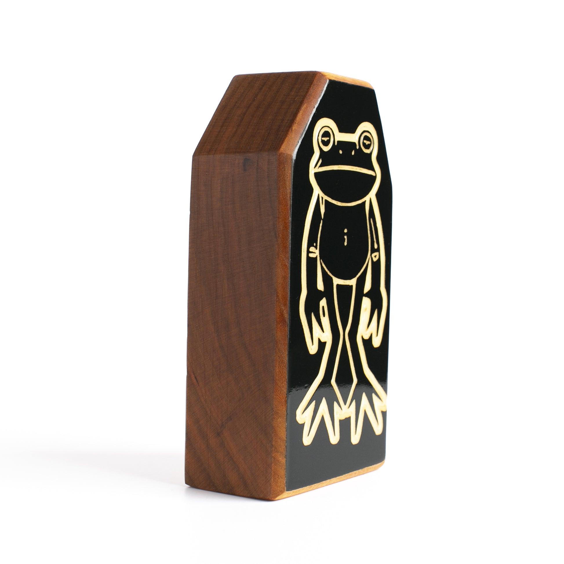 Floopfin handcrafted cherry wood talisman 3/4 side view with glow-in-the-dark accents.