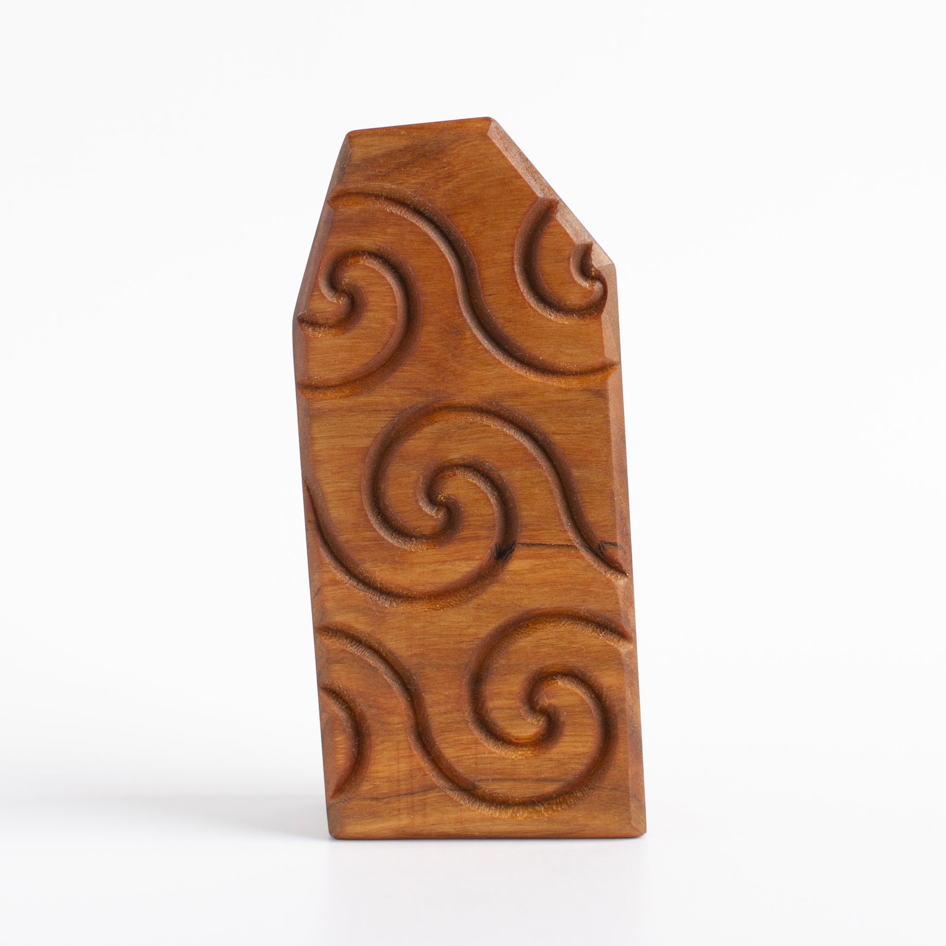 Back view of Floopfin showcasing the swirl timber pattern and natural wood finish.
