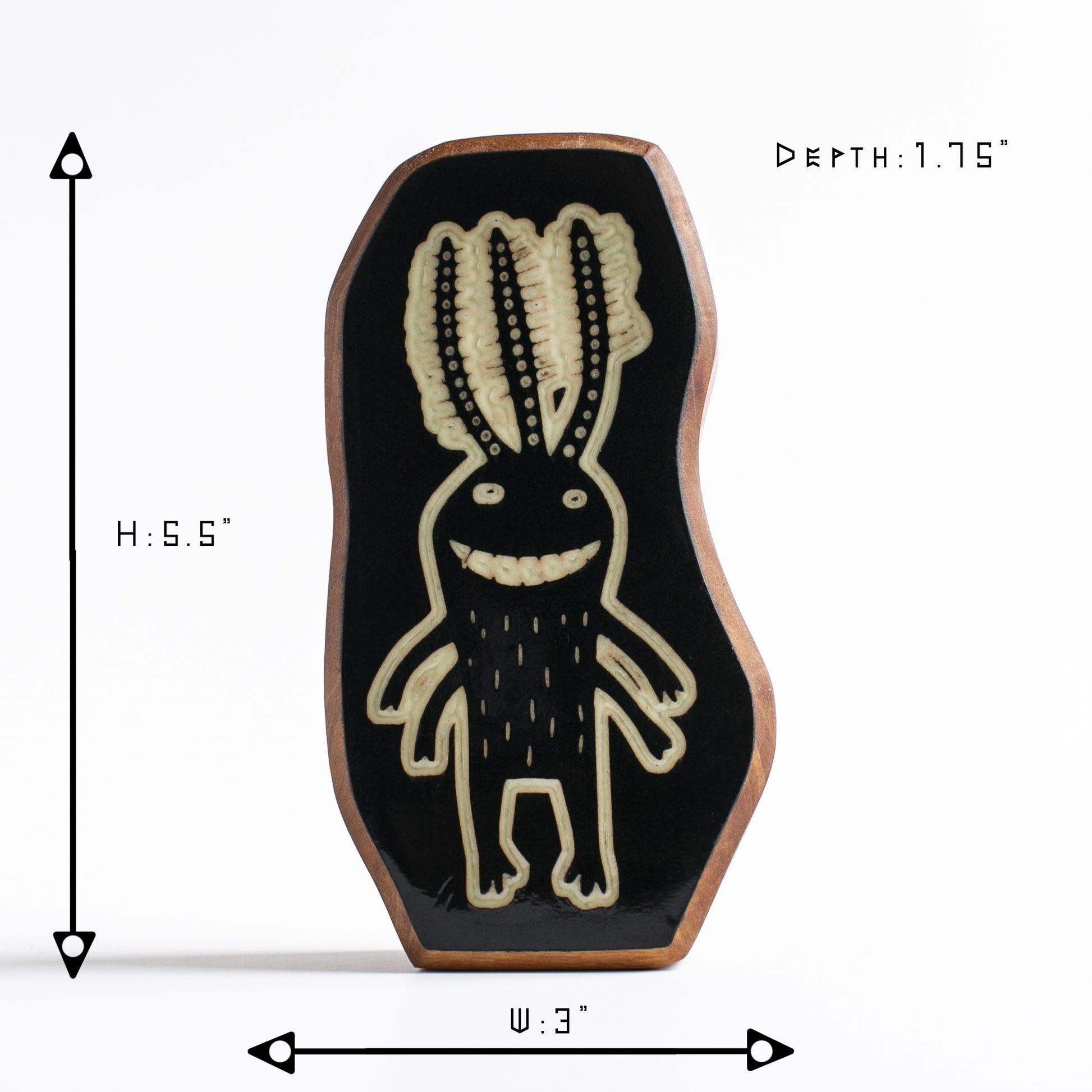 Cherry wood glow talisman featuring Fluxoid the calming protector