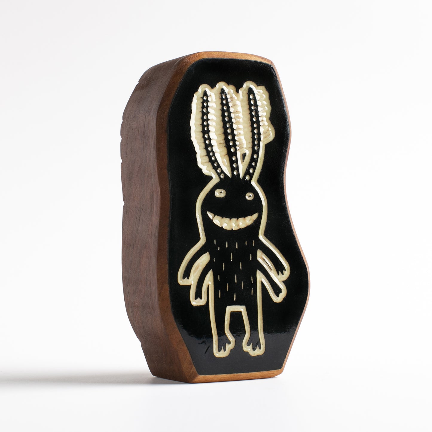 Cherry wood talisman with Fluxoid design for kids’ bedtime comfort