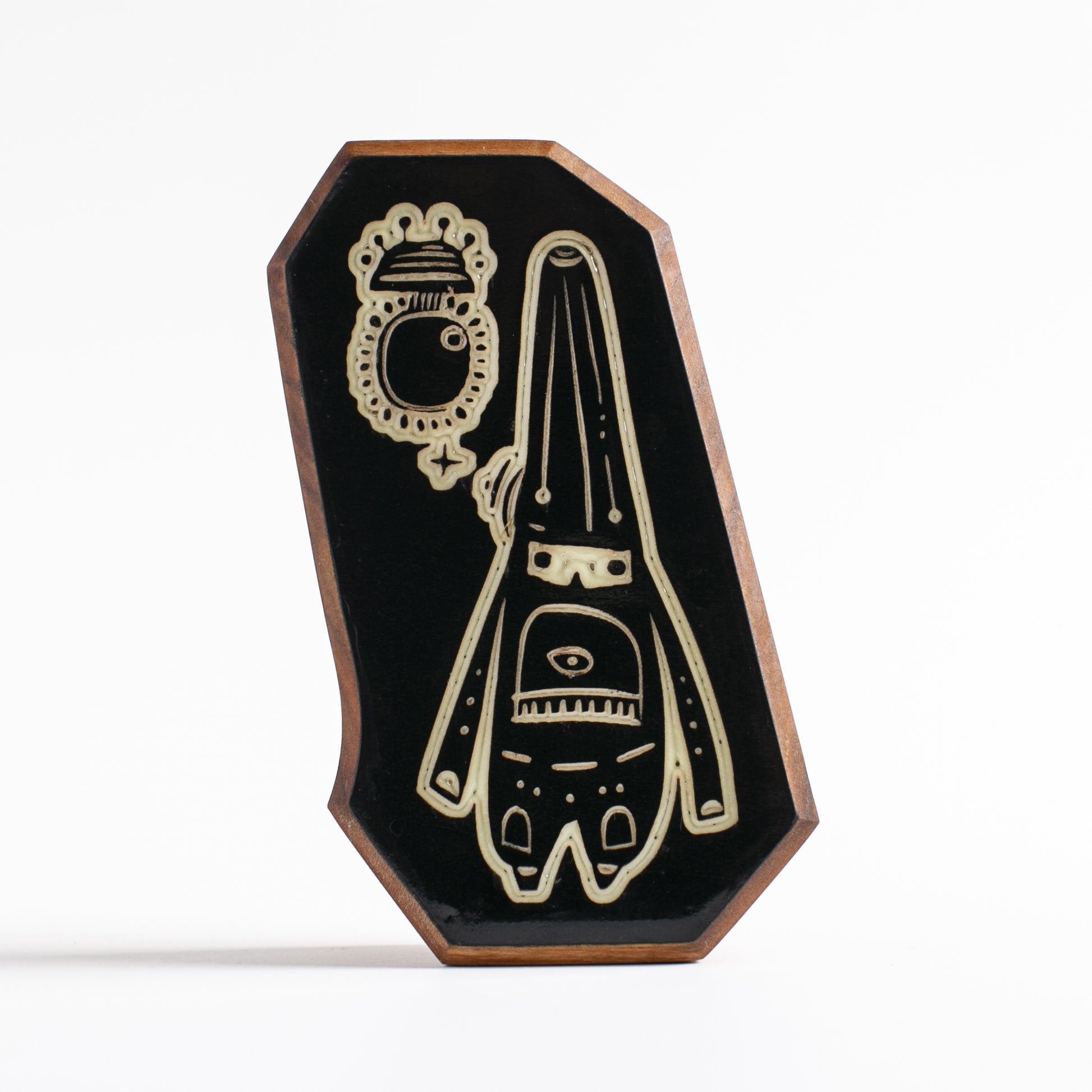 Handcrafted glow-in-the-dark talisman featuring Glimbop and Quazglitz the interdimensional duo