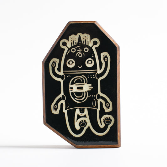 Handcrafted glow-in-the-dark talisman featuring Glimborg the ancient underwater spirit