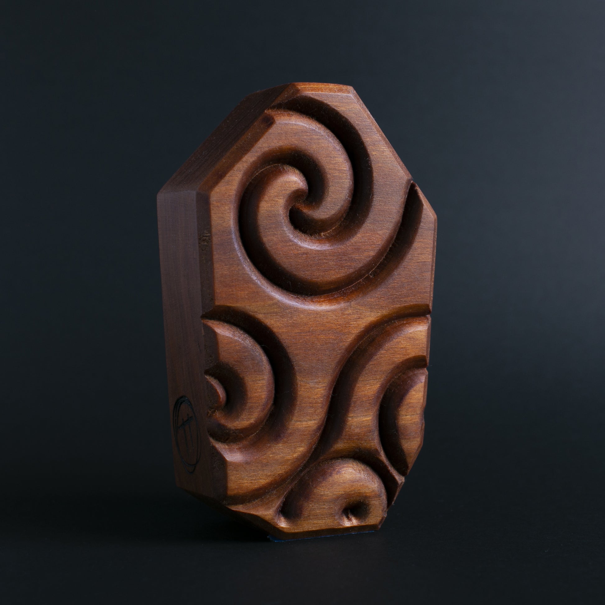 Glow-in-the-dark wooden talisman of Glintorb ensuring a safe and soothing bedtime