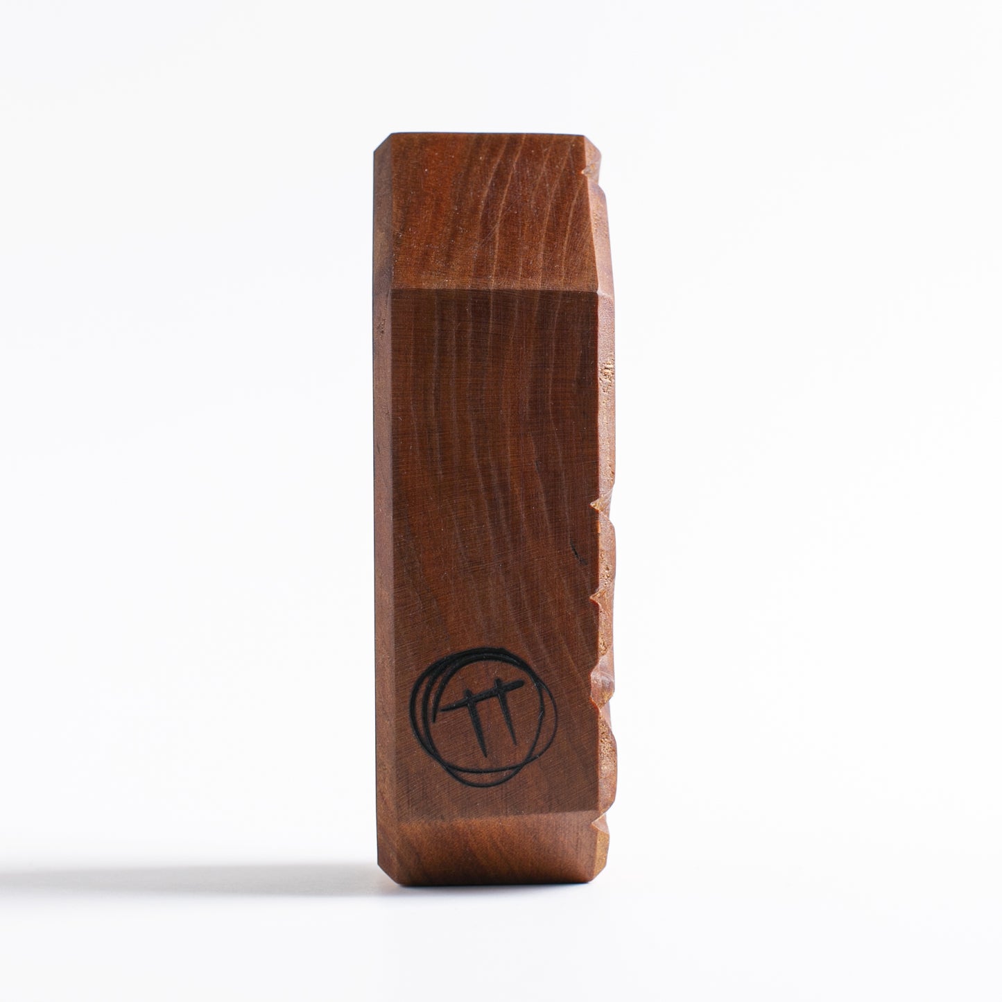 Handmade wooden talisman of Glintorb offering protection and calming sounds