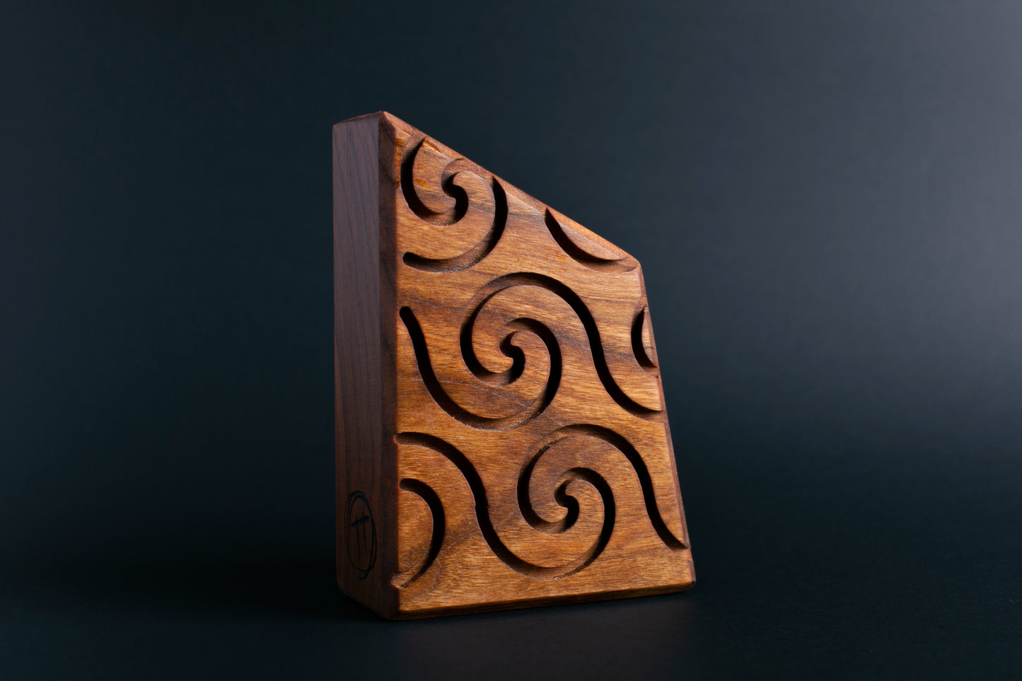 Glow-in-the-dark wooden talisman of Snazzle ensuring a calming and sparkling sleep
