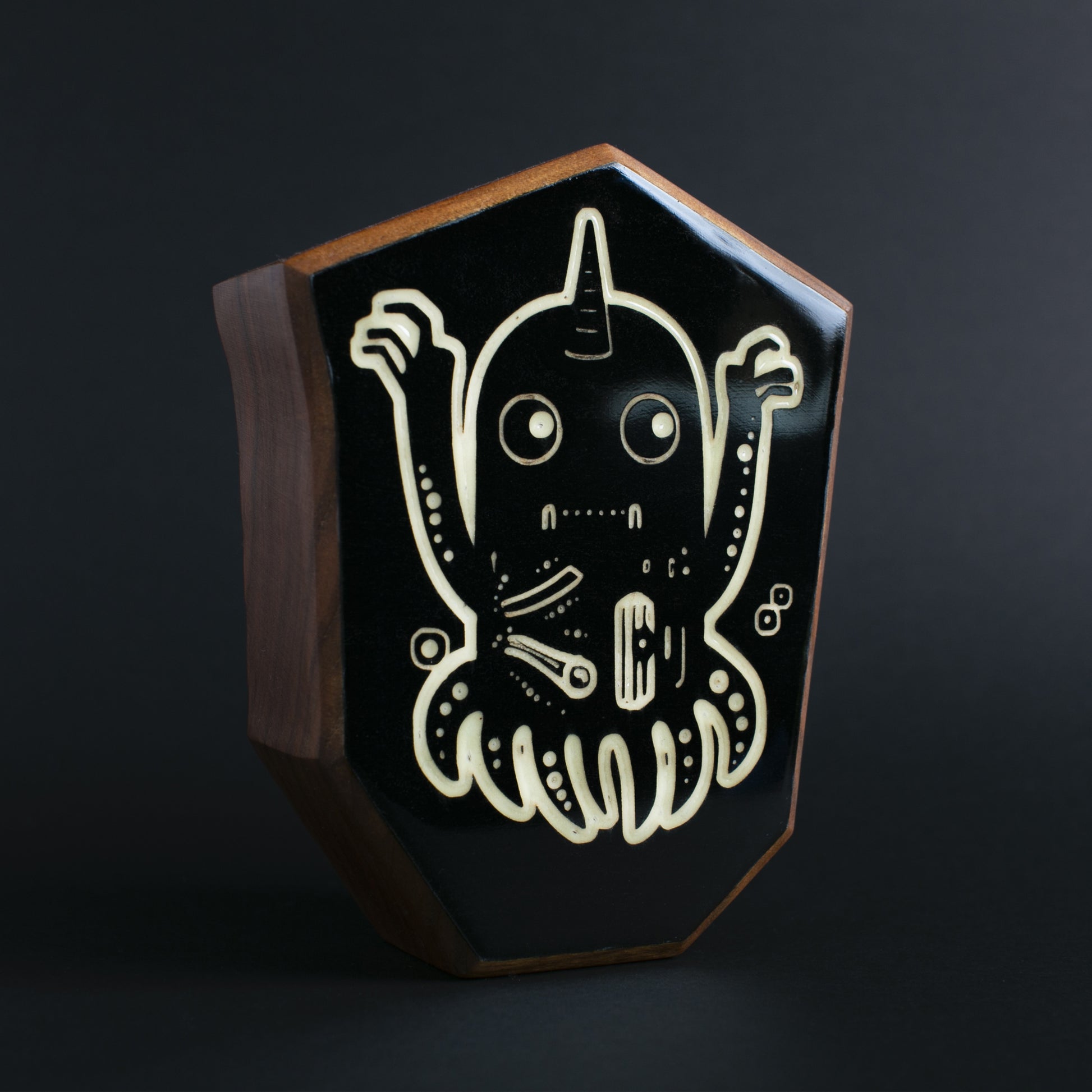 Handcrafted Jellywobble charm radiating bright colors to shield kids at night