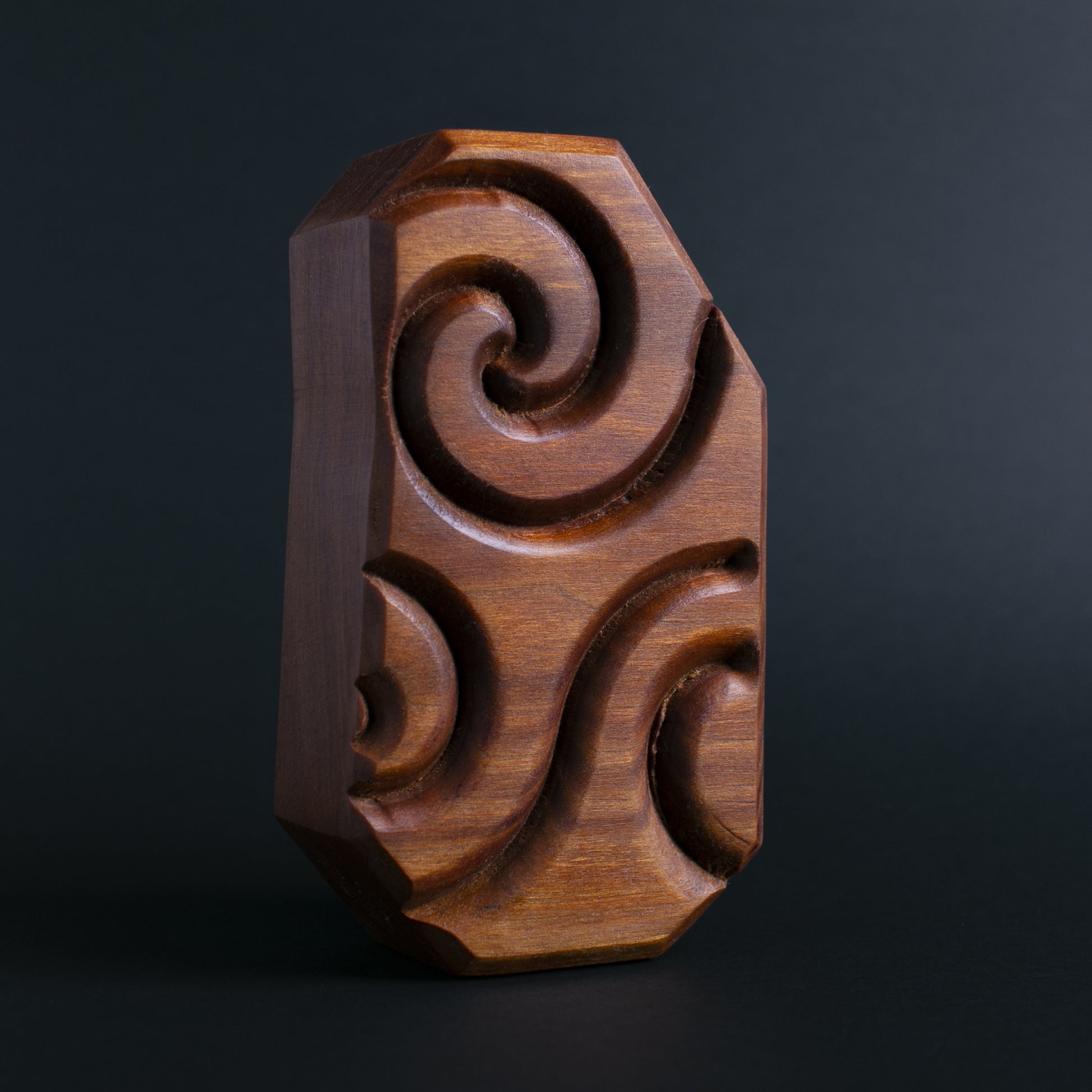 Glow-in-the-dark wooden talisman of Nebulax ensuring peaceful and safe sleep