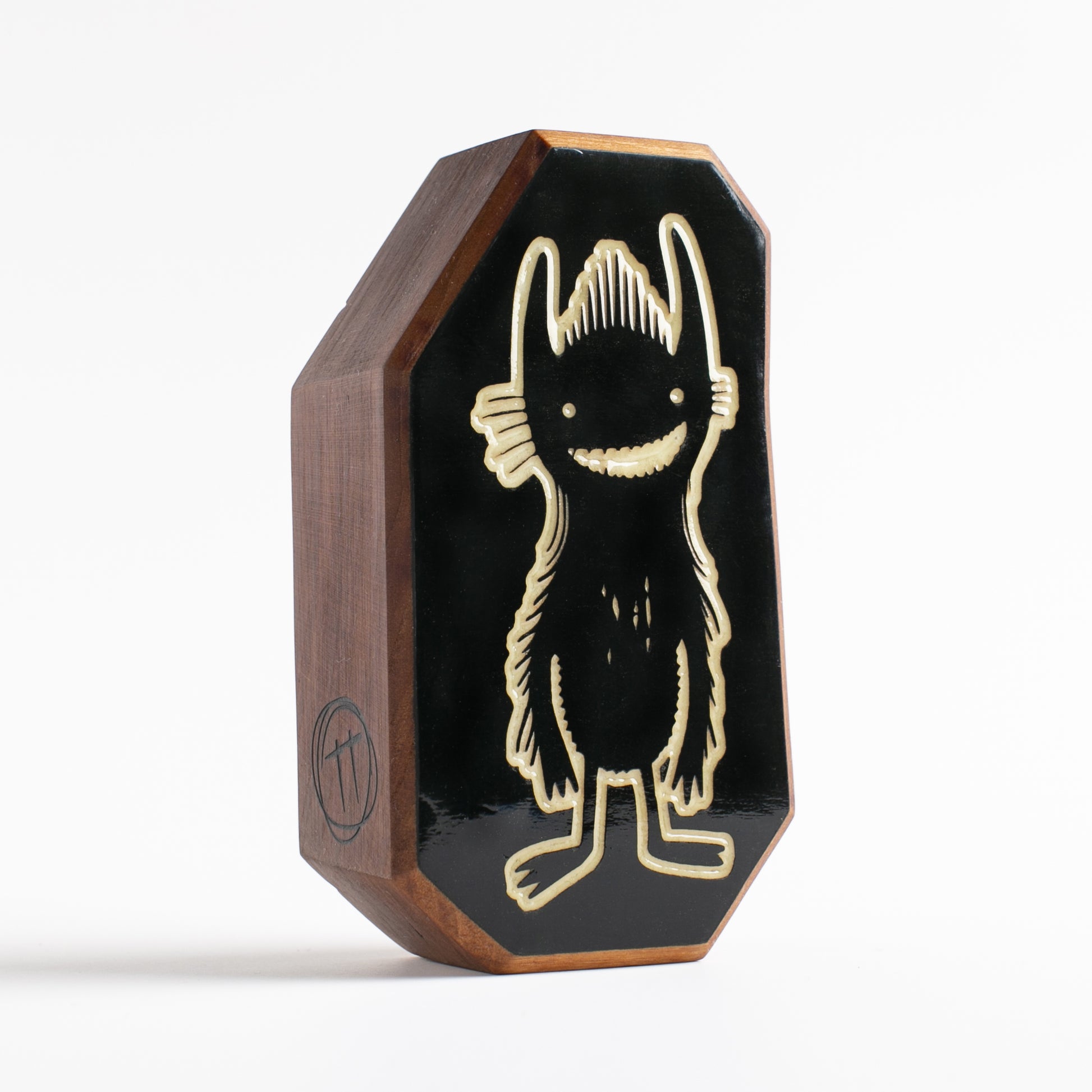 Cherry wood talisman with Nebulax design offering kids comfort at bedtime