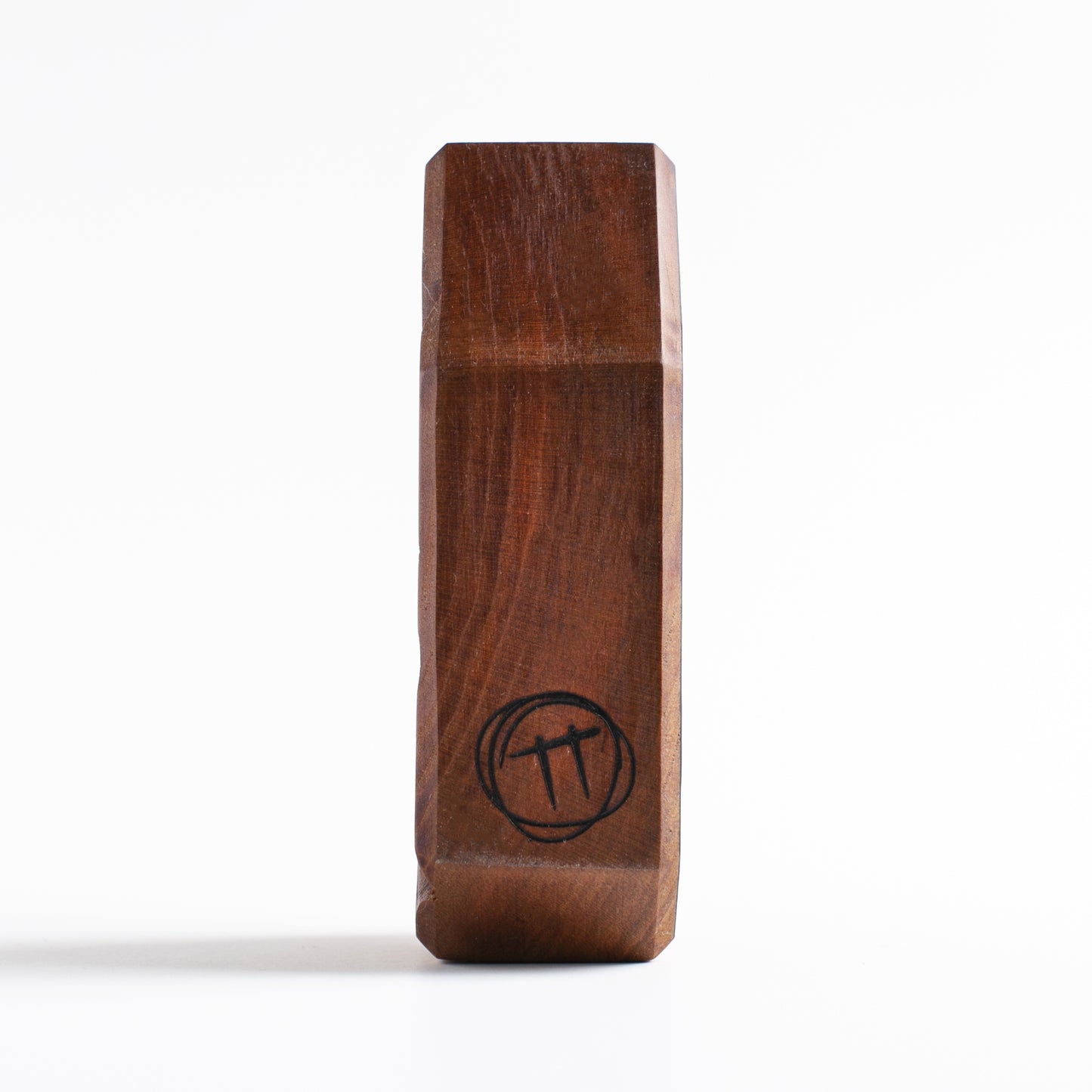 Handmade wooden talisman of Nebulax emitting powerful beams of light at night