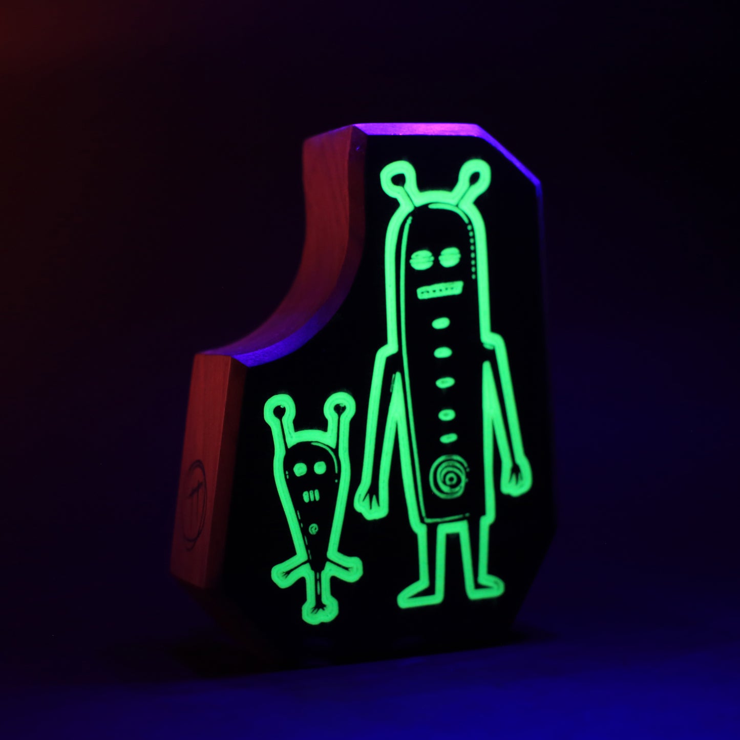 Nixblip and Blizmor wooden charm glowing brightly to trap nighttime monsters