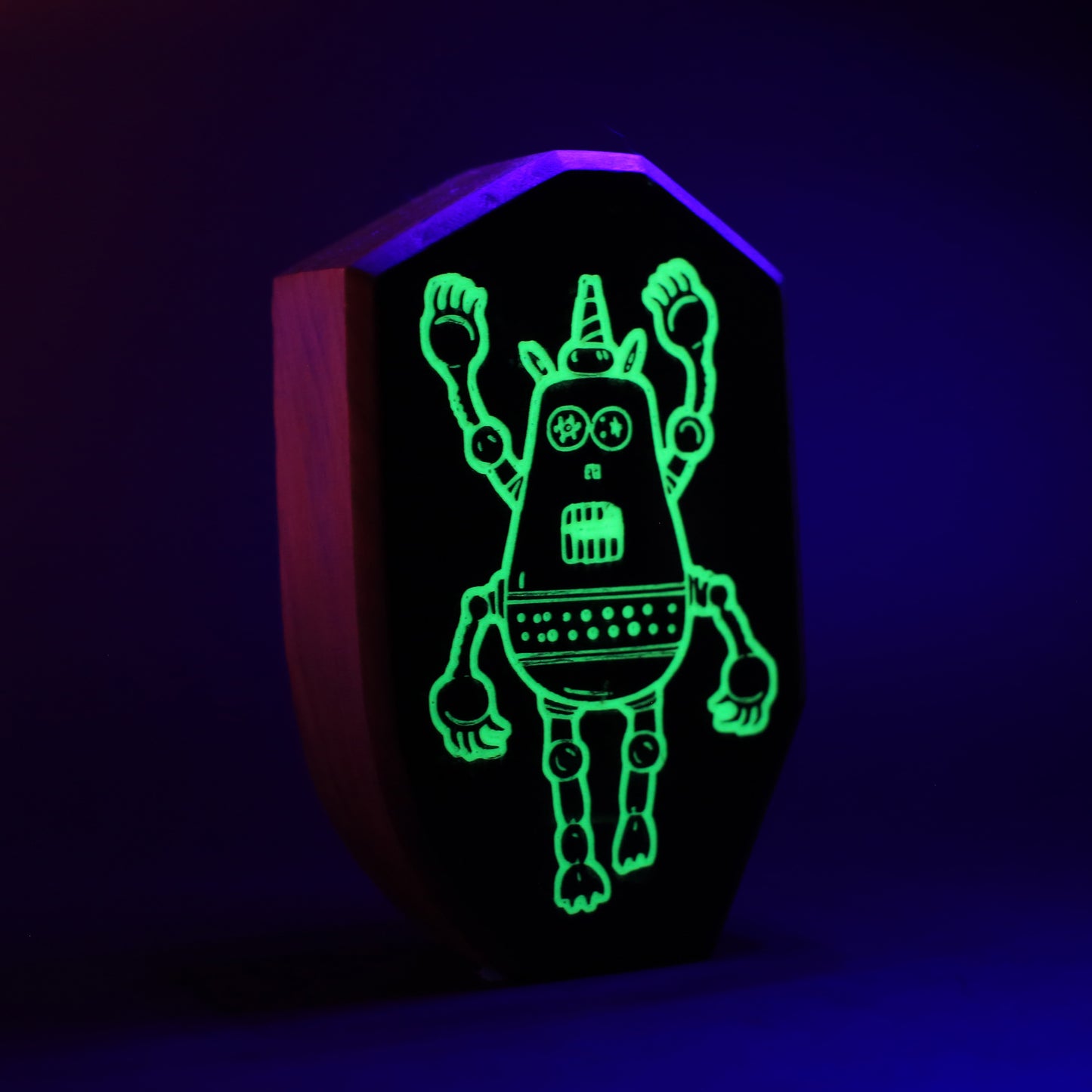 Plazmorp wooden charm glowing softly to create a barrier of light at bedtime
