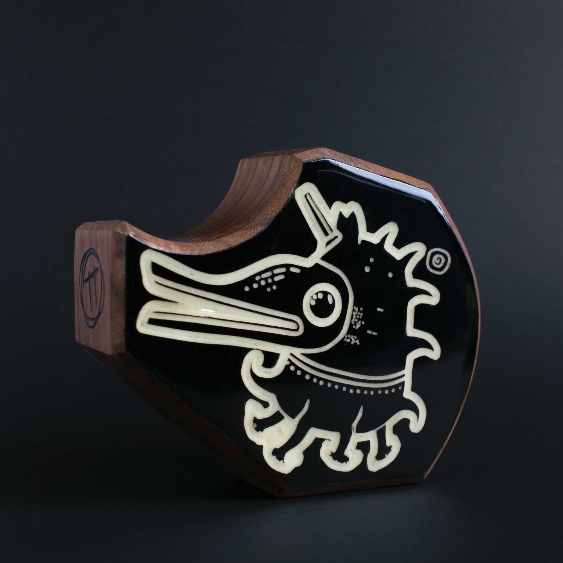 Handcrafted Plonkzoid charm designed to protect children through calming light