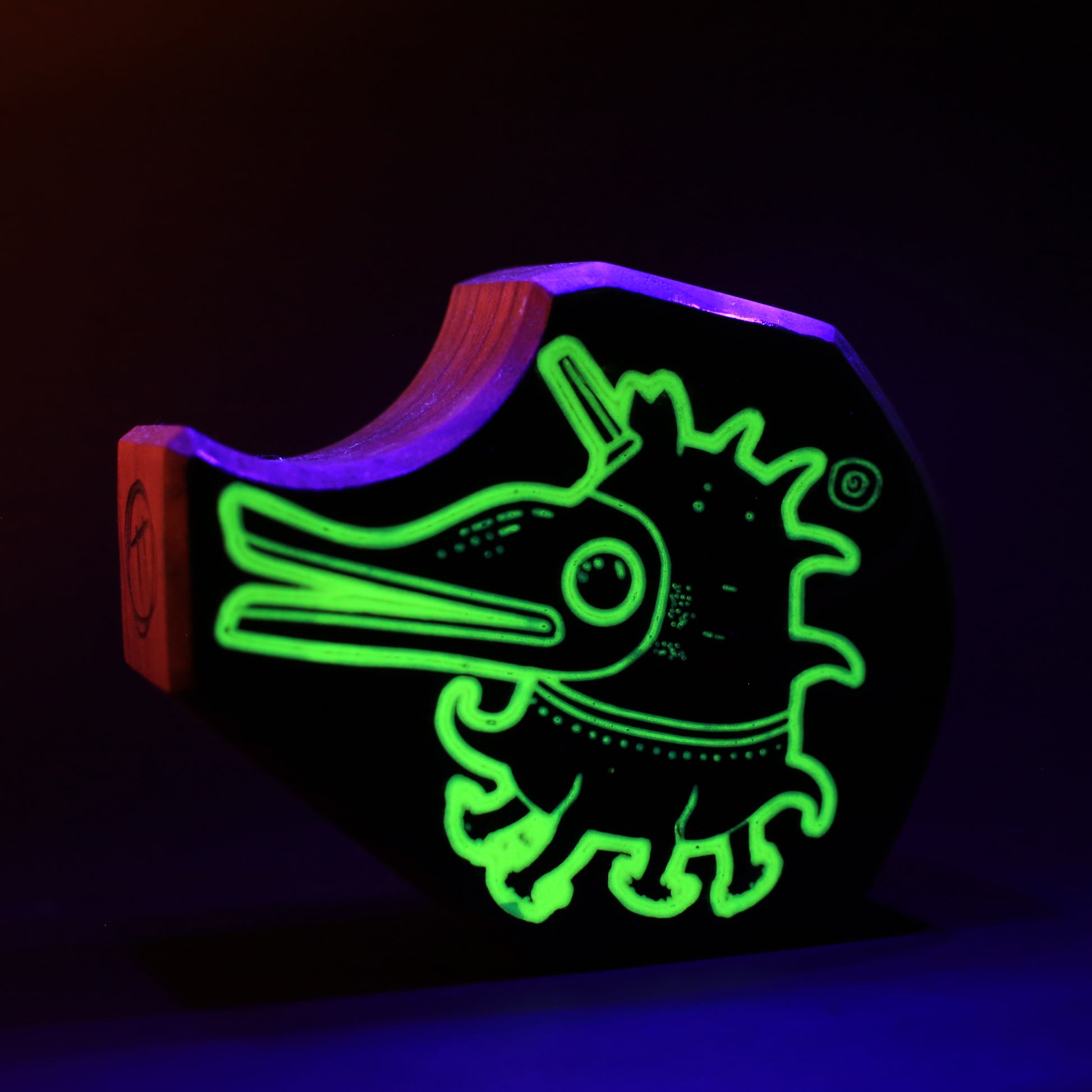 Plonkzoid wooden charm glowing softly to create a protective light barrier at bedtime