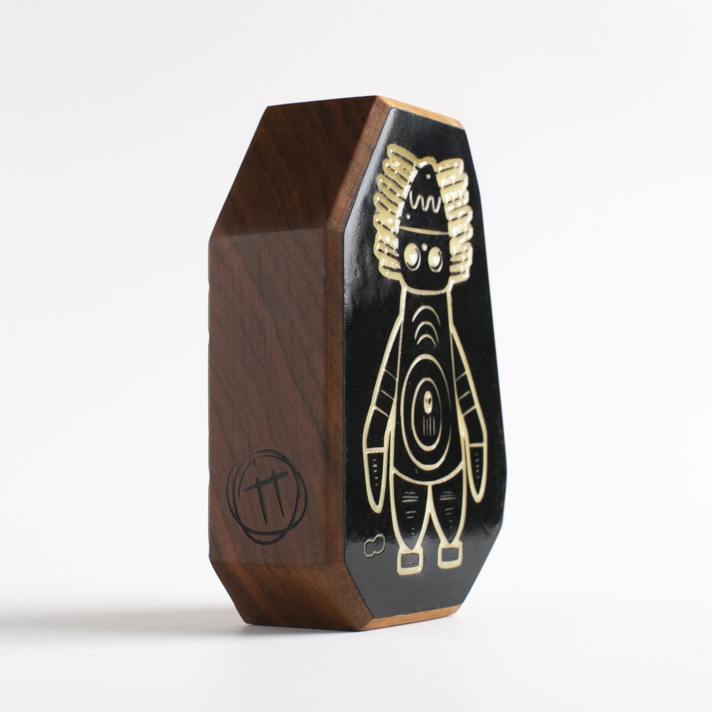 Cherry wood talisman with Pyronoid design offering kids comforting nighttime protection