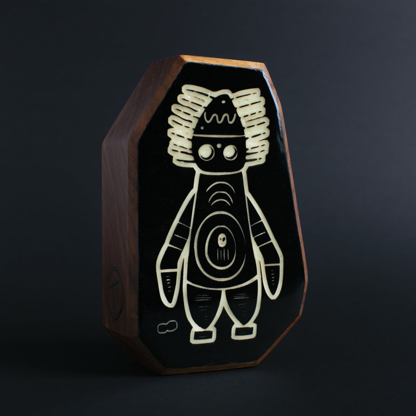 Cherry wood glow talisman featuring Pyronoid the spiky-headed protector