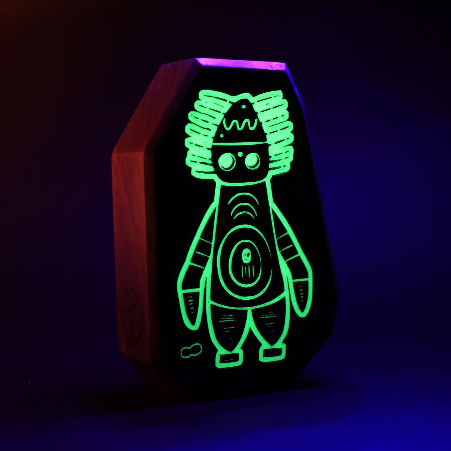 Pyronoid wooden charm glowing brightly to zap away scary nighttime shadows