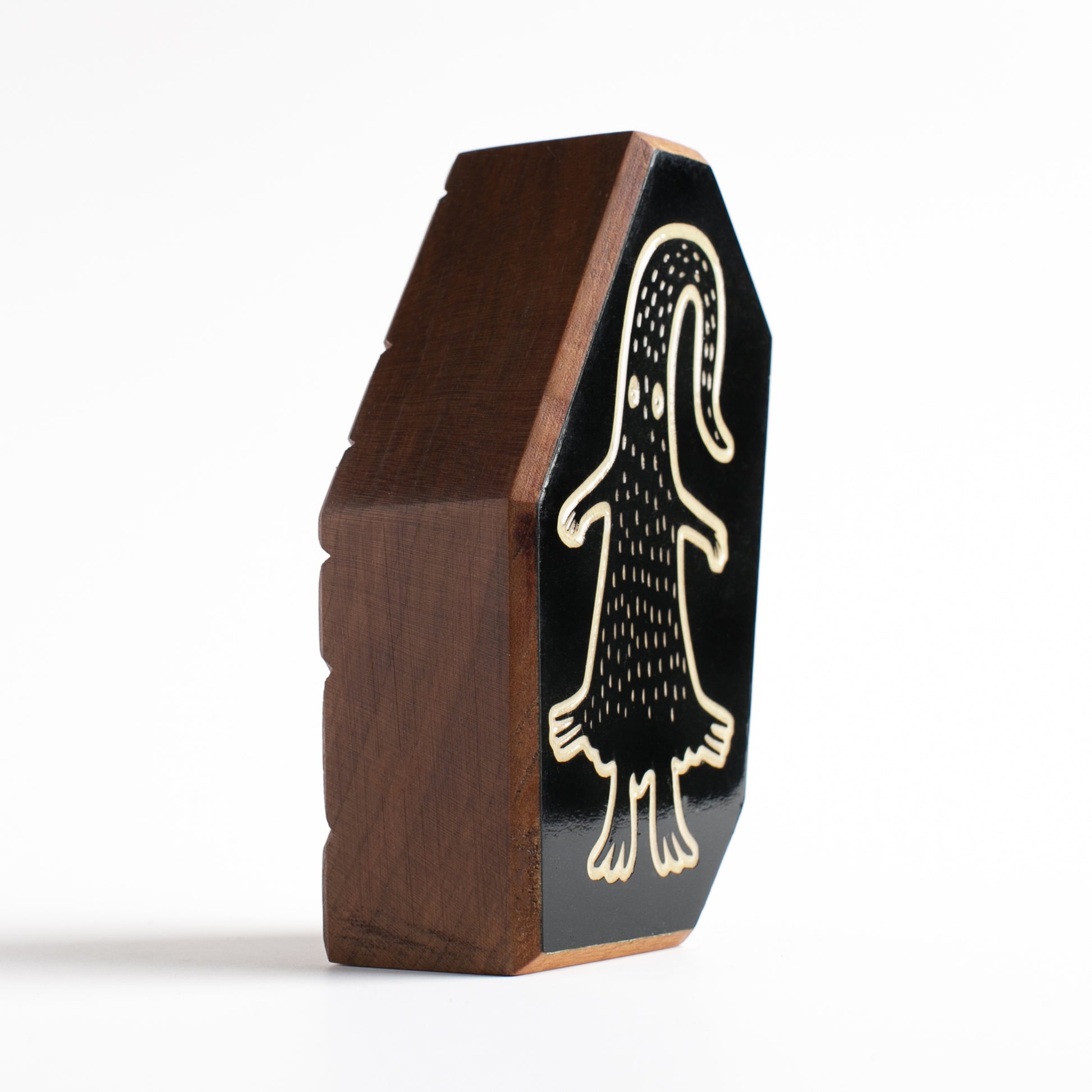 Glow-in-the-dark guardian Quibblex protecting children from shadows and monsters