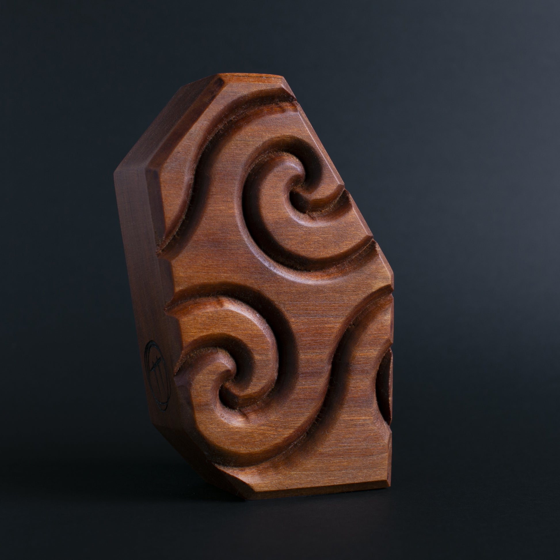 Glow-in-the-dark wooden talisman of Quibblex ensuring peaceful and magical sleep