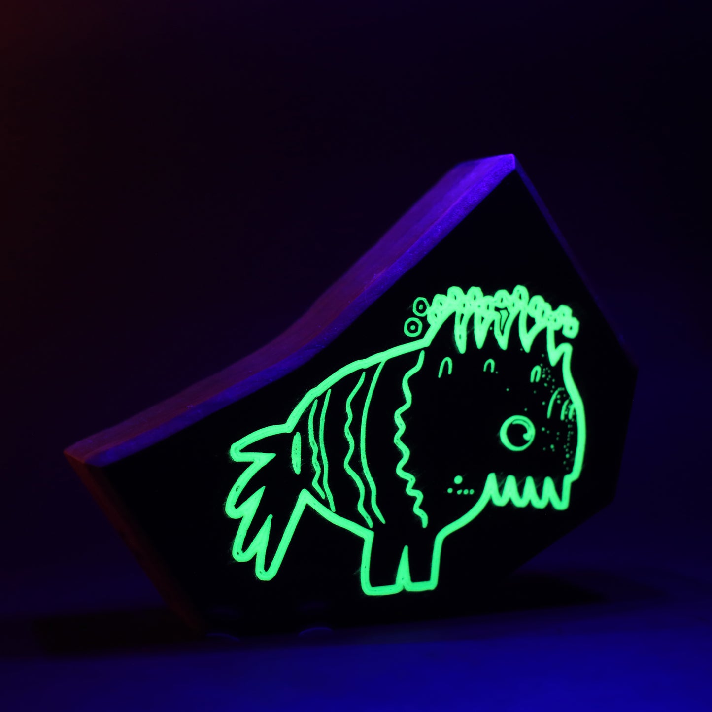 Snorfblip wooden charm glowing softly to turn monsters into harmless sparkles