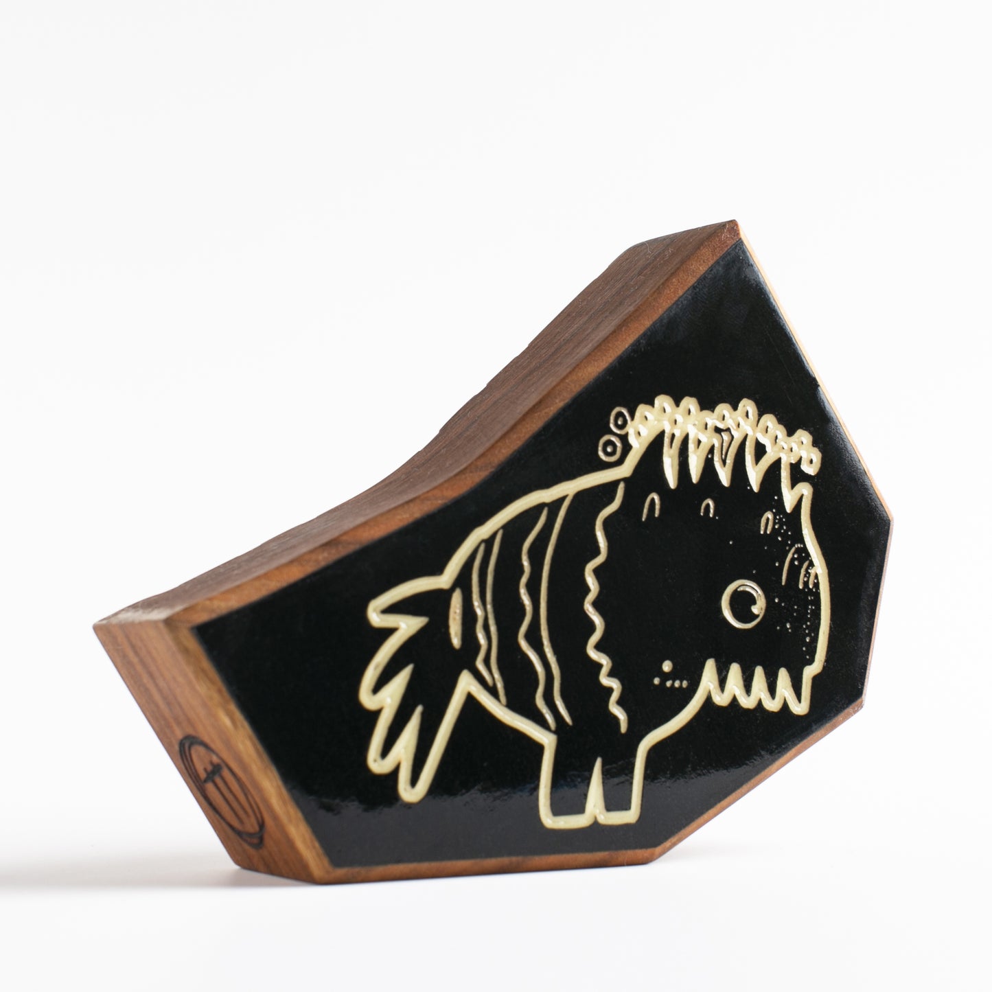 Cherry wood talisman with Snorfblip design offering kids nighttime comfort and safety