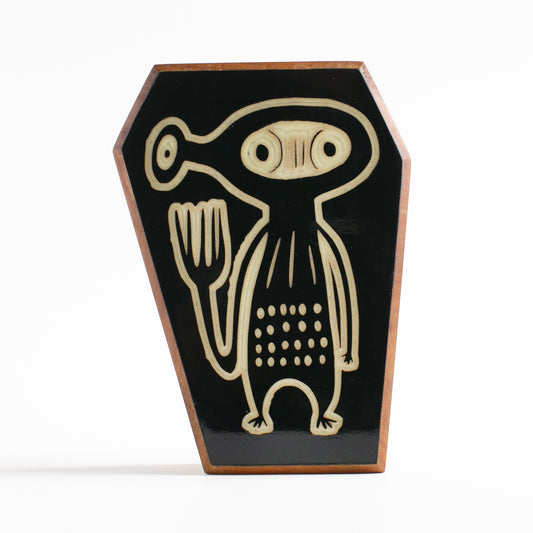 Handcrafted glow-in-the-dark talisman featuring Xyloid the cosmic alien traveler