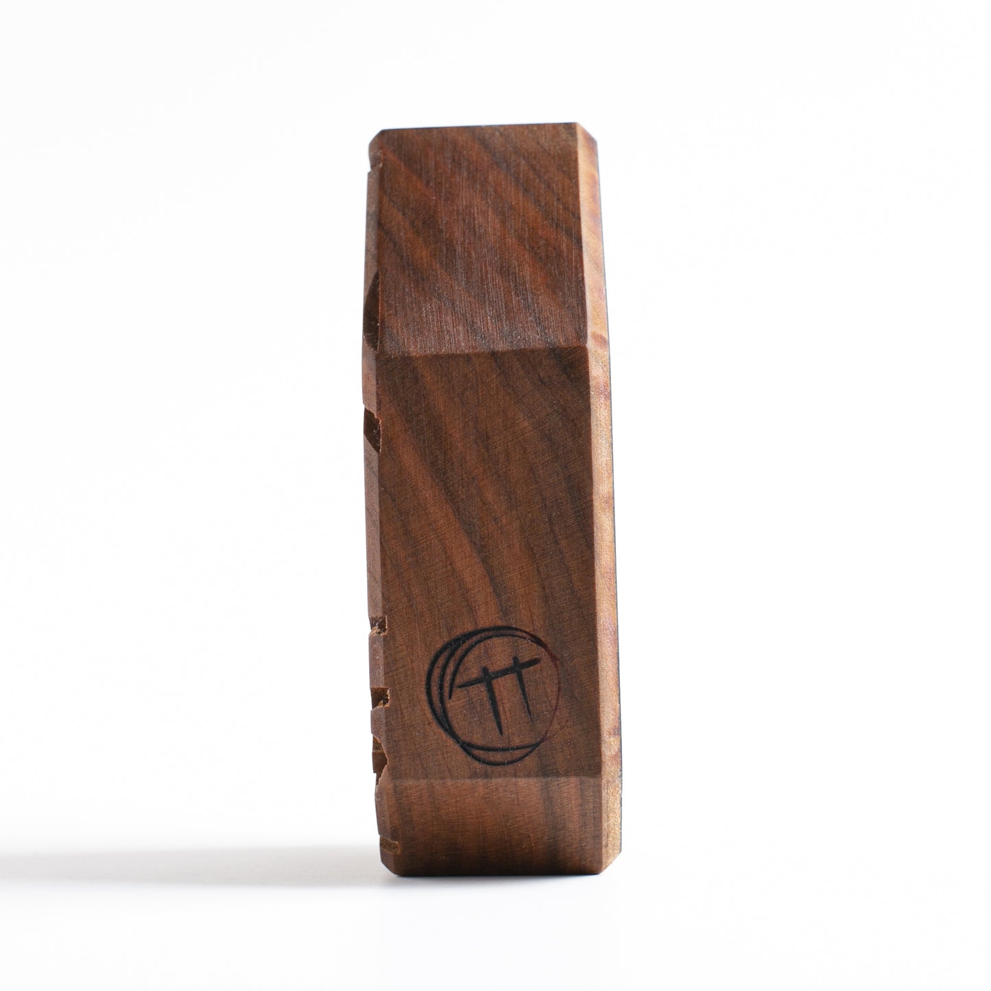 Handmade wooden talisman of Zorpwob providing a calming glow for peaceful sleep