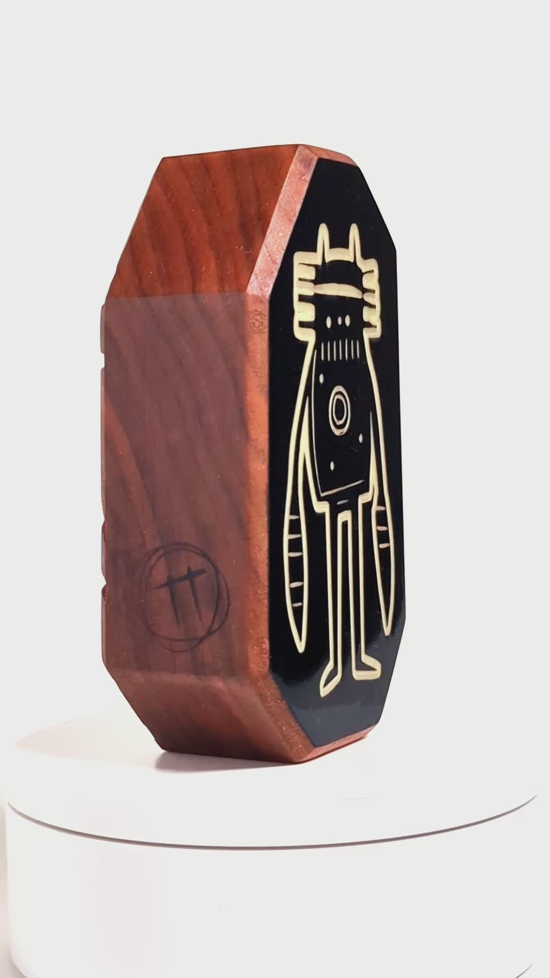 Wooden robot talisman with glowing light to protect against nighttime shadows