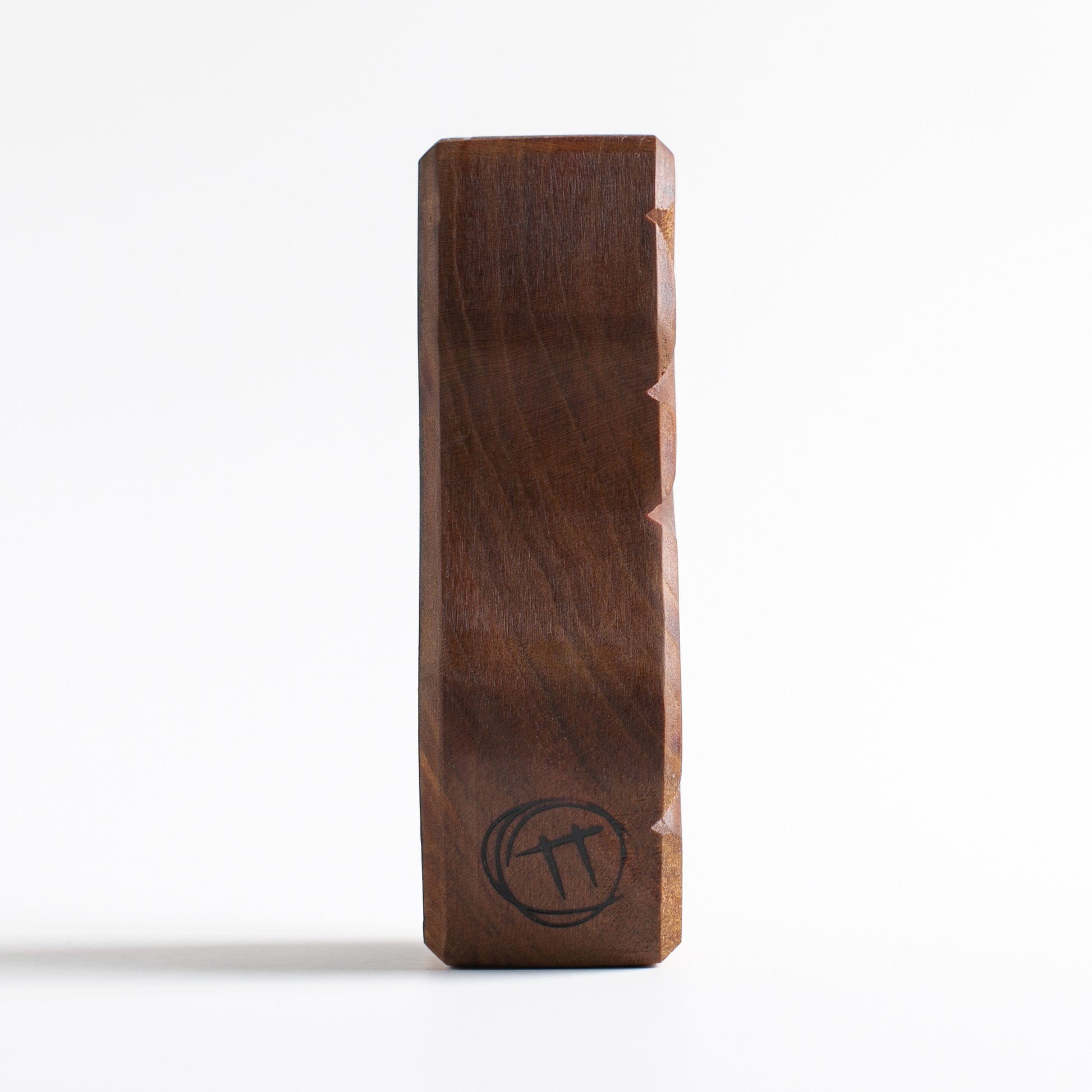 Handmade wooden talisman of Fluxoid offering nighttime protection for children
