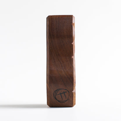 Handmade wooden talisman of Fluxoid offering nighttime protection for children
