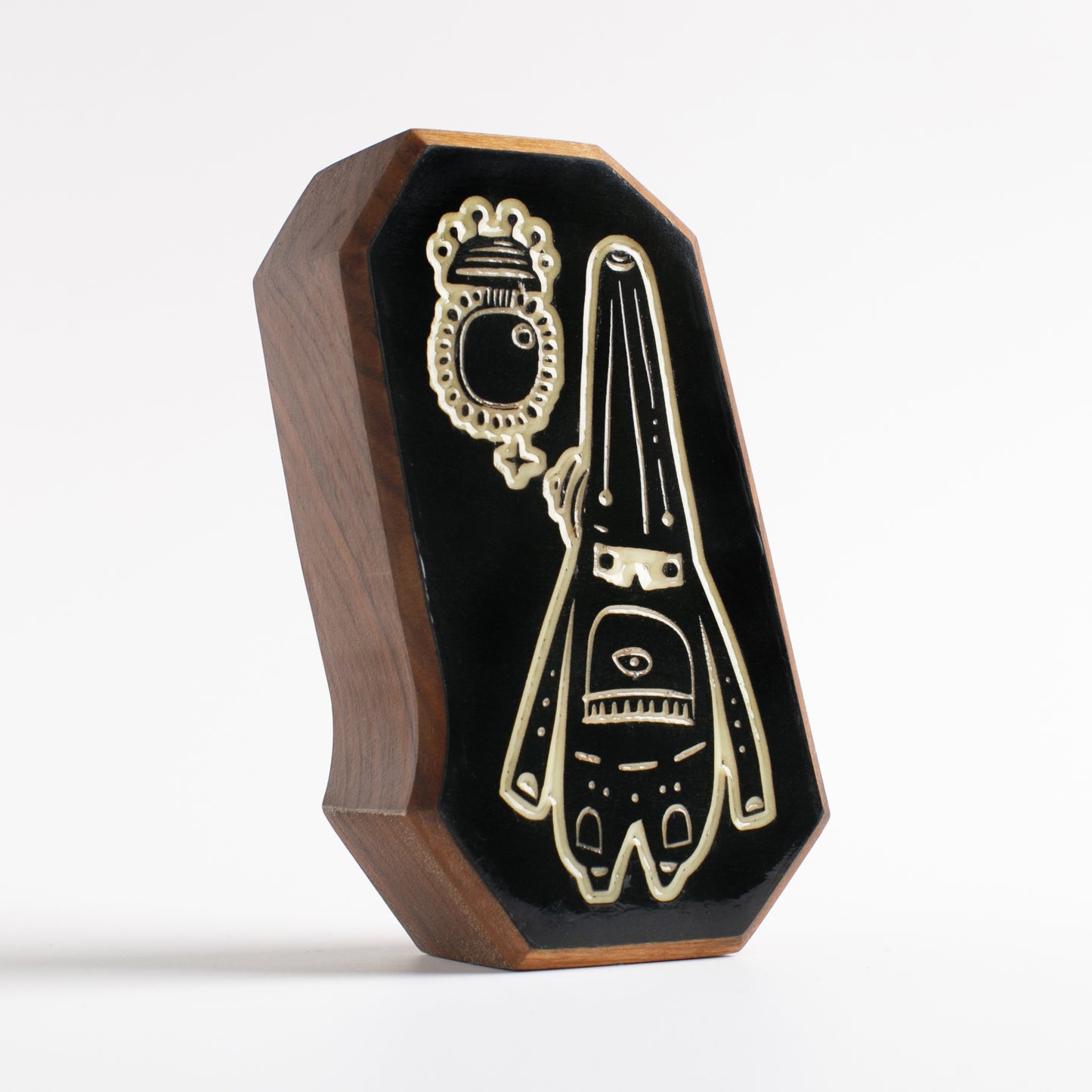 Cherry wood talisman with Glimbop and Quazglitz design for kids’ nighttime comfort
