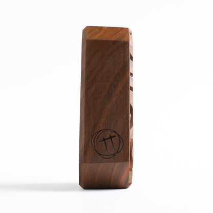 Handmade wooden talisman of Glimbop and Quazglitz providing a calming nighttime glow
