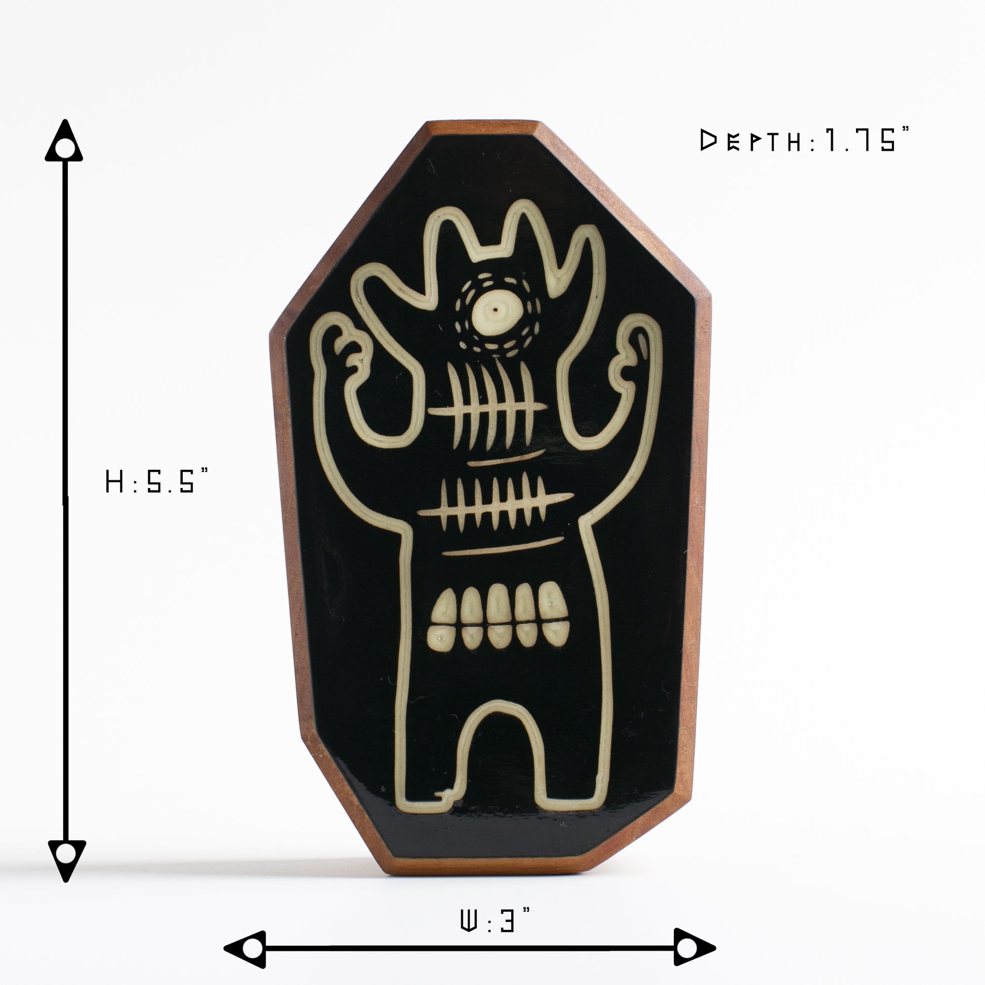 Cherry wood glow talisman featuring Glintorb the protective alien visitor
