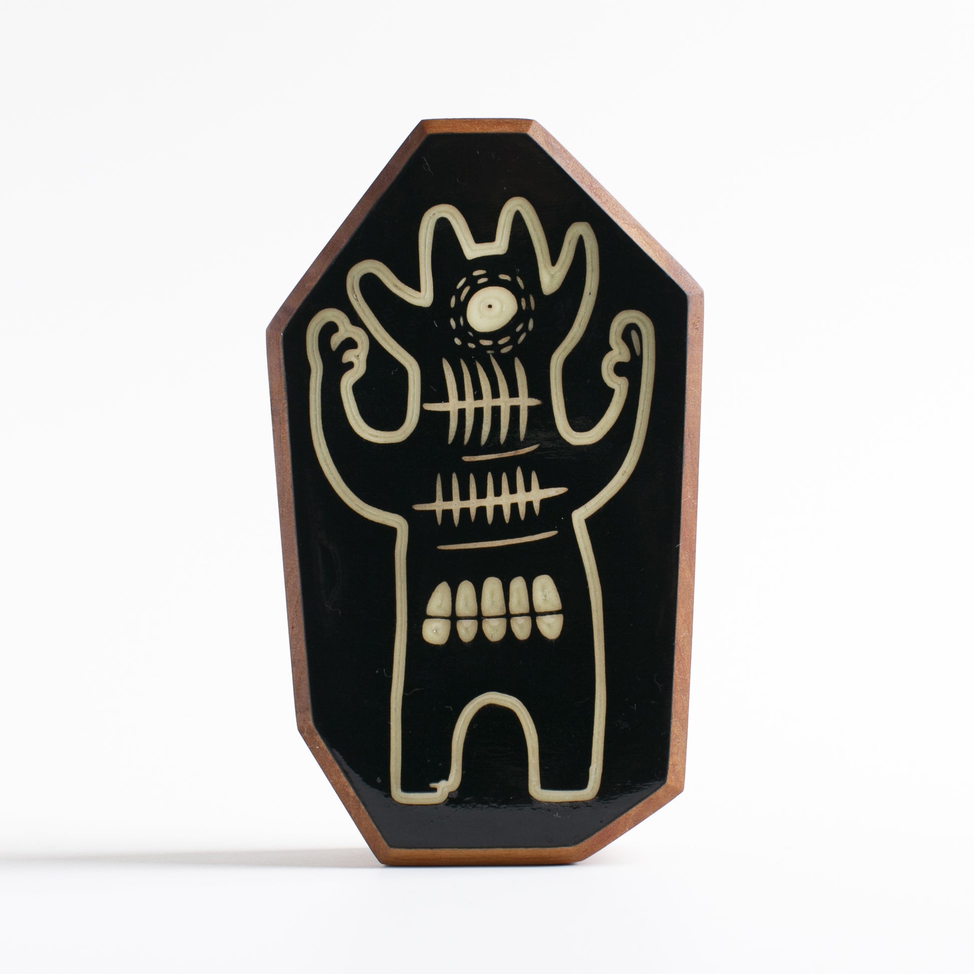 Handcrafted glow-in-the-dark talisman featuring Glintorb the calming alien visitor
