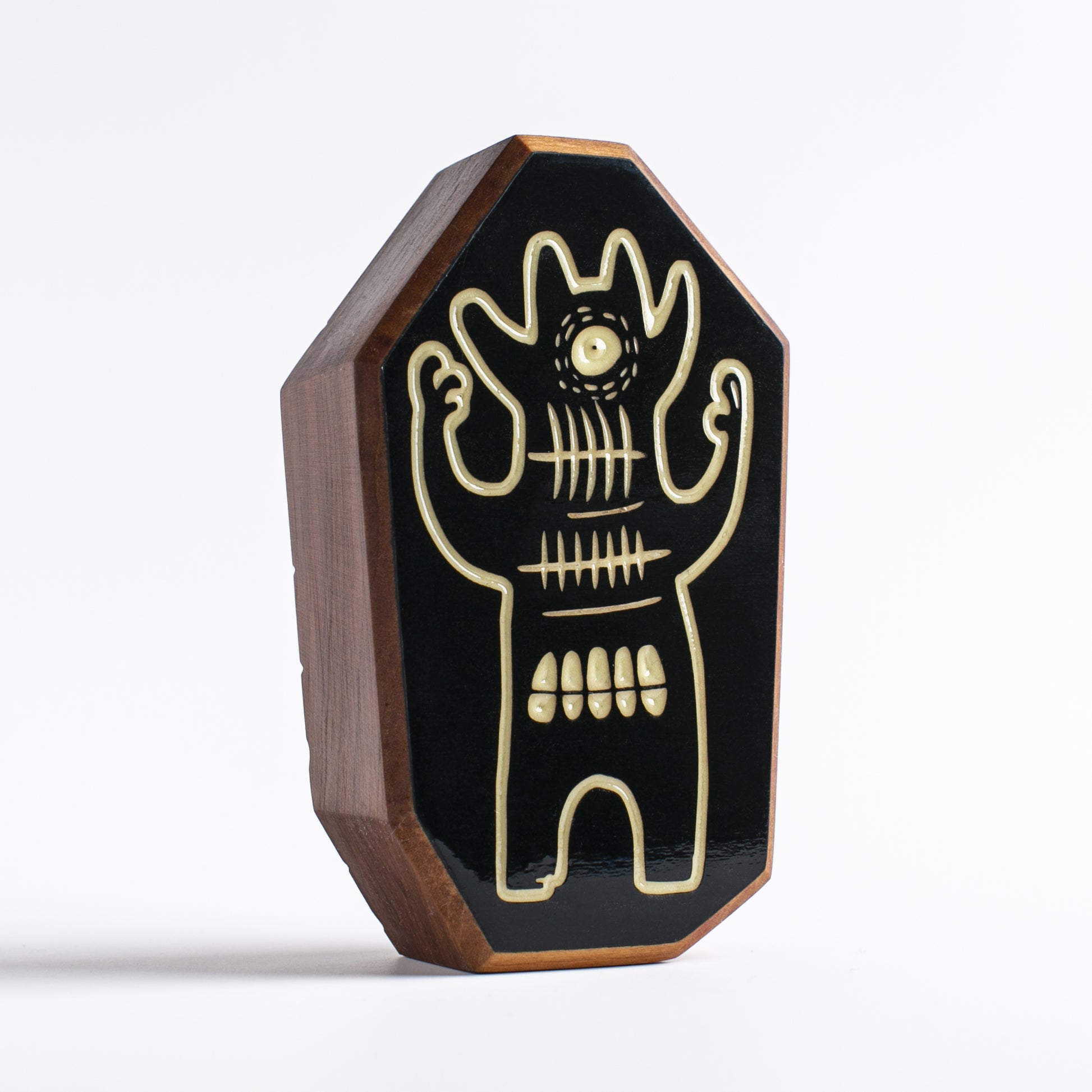 Cherry wood talisman with Glintorb design for kids’ nighttime comfort
