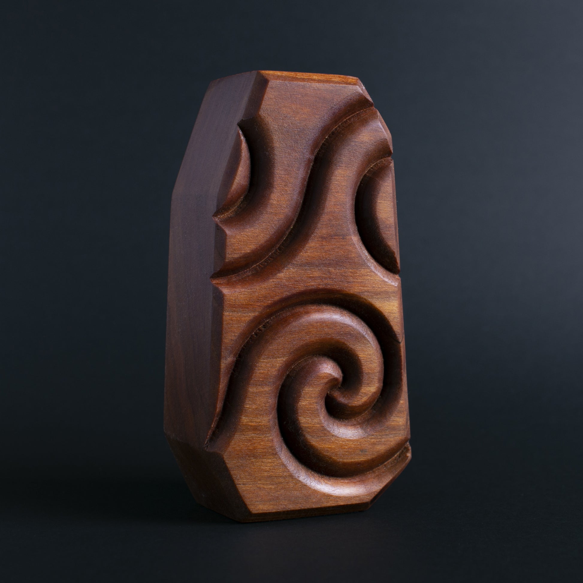 Glow-in-the-dark wooden talisman of Glowbop ensuring a secure and calming sleep
