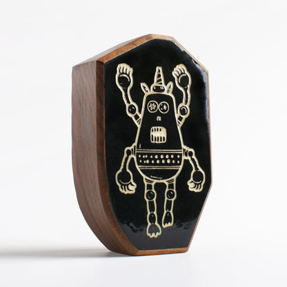 Cherry wood talisman with Plazmorp design offering kids nighttime comfort
