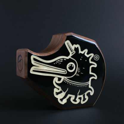 Handcrafted Plonkzoid charm designed to protect children through calming light
