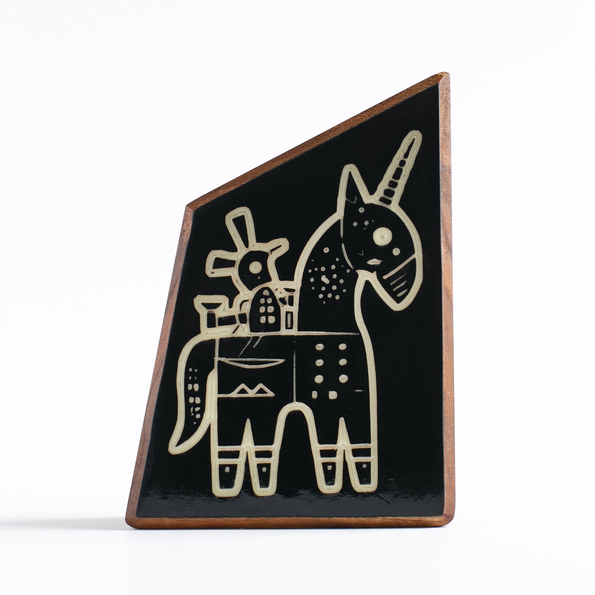 Handcrafted glow-in-the-dark talisman featuring Snazzle the whimsical unicorn
