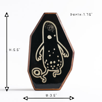 Wooden guardian Snorble glowing brightly to shield kids at bedtime
