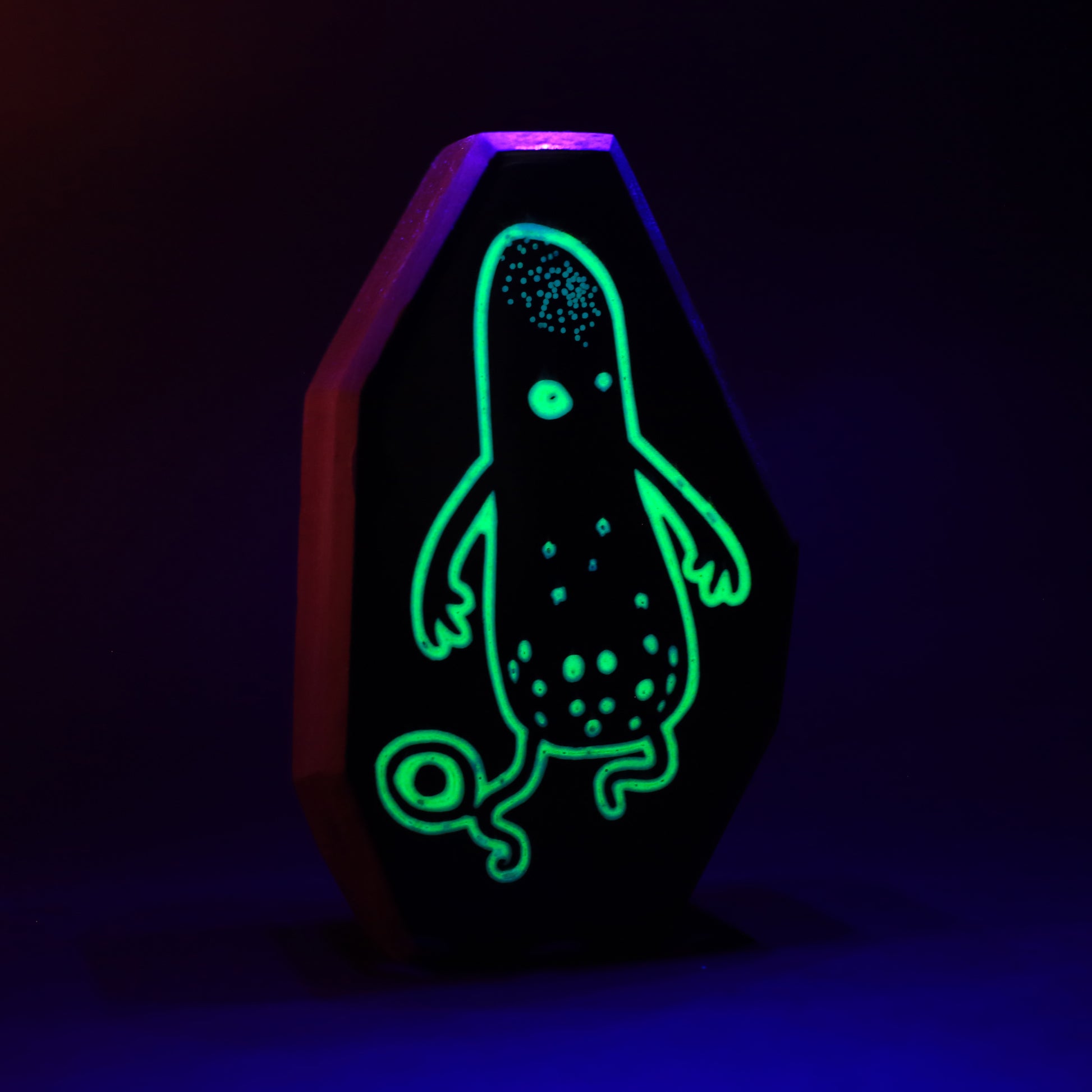 Snorble wooden charm glowing softly to splash away nighttime monsters
