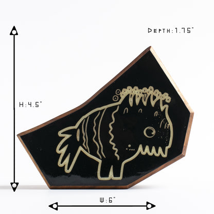 Wooden guardian Snorfblip glowing brightly to shield kids from nighttime fears
