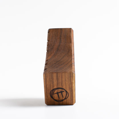 Handmade wooden talisman of Snorfblip ensuring peaceful and magical sleep
