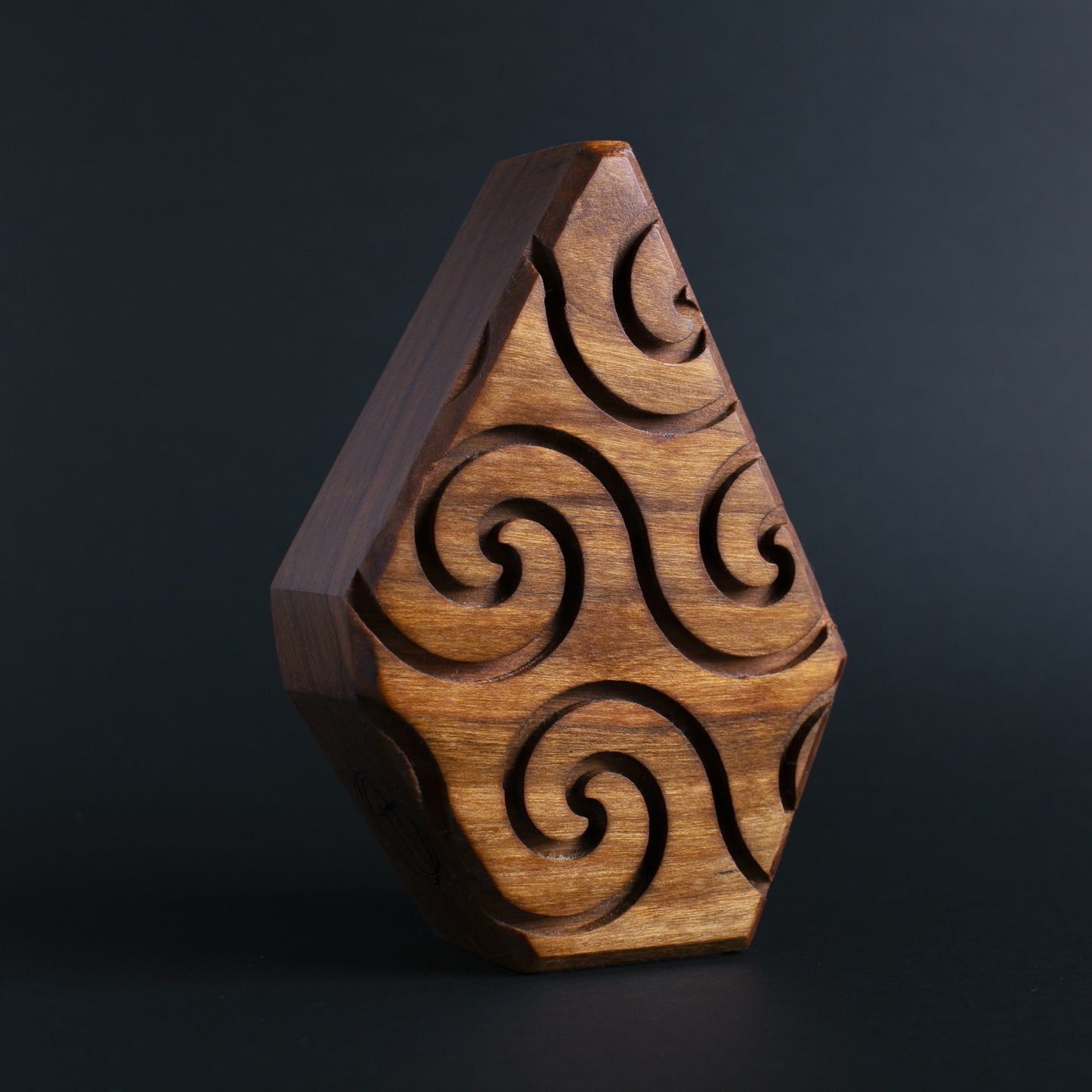 Glow-in-the-dark wooden talisman of Squibnik ensuring a secure and magical sleep
