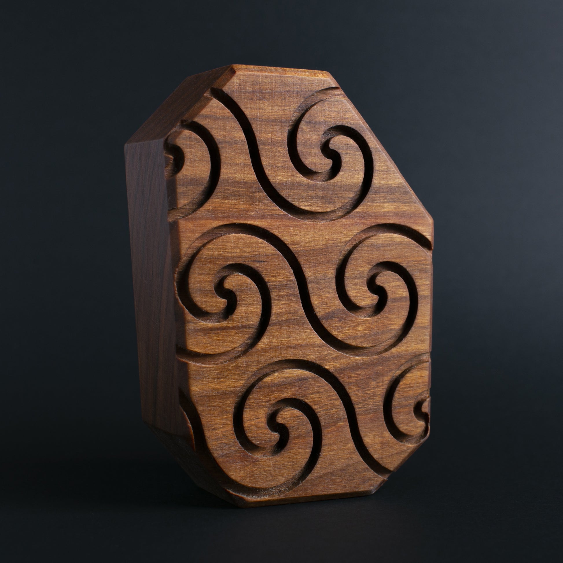 Glow-in-the-dark wooden talisman of Zorpwob ensuring a calm and restful sleep

