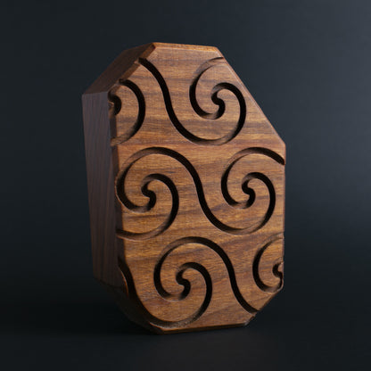 Glow-in-the-dark wooden talisman of Zorpwob ensuring a calm and restful sleep
