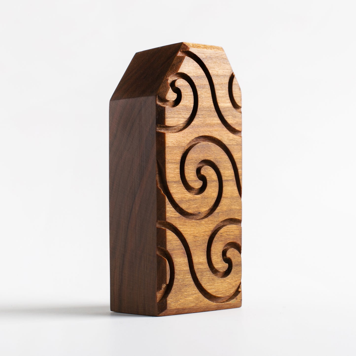 Zybotronk glow-in-the-dark charm crafted to repel monsters with reflective light
