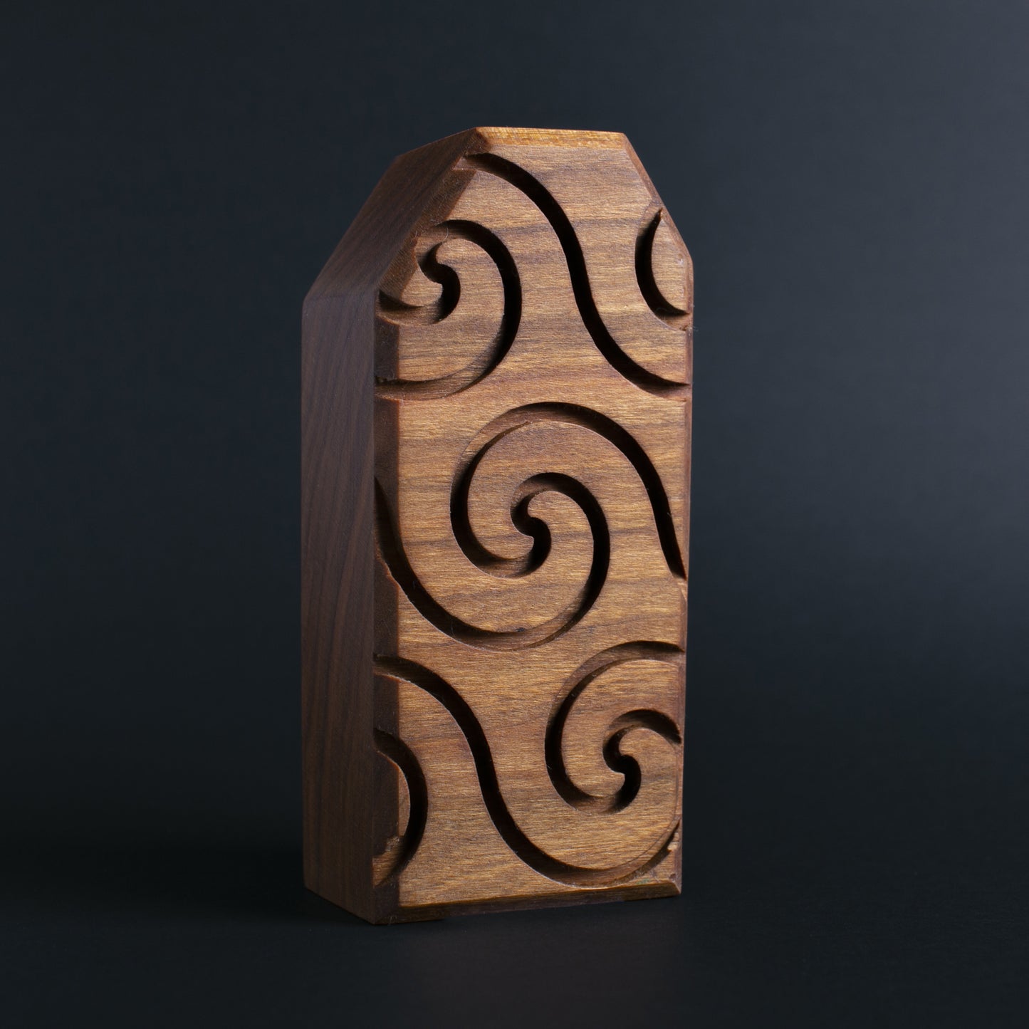 Glow-in-the-dark wooden talisman of Zybotronk ensuring a secure and peaceful sleep
