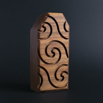 Glow-in-the-dark wooden talisman of Zybotronk ensuring a secure and peaceful sleep
