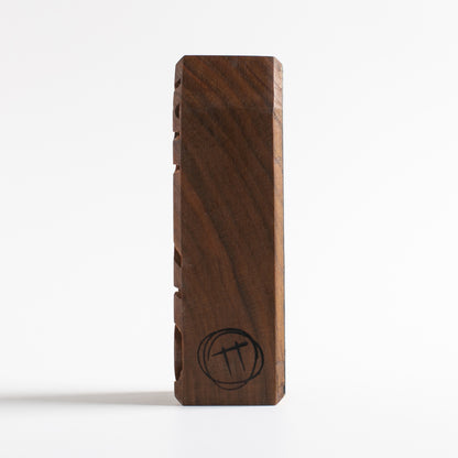 Handmade wooden talisman of Zybotronk providing peace and safety at bedtime
